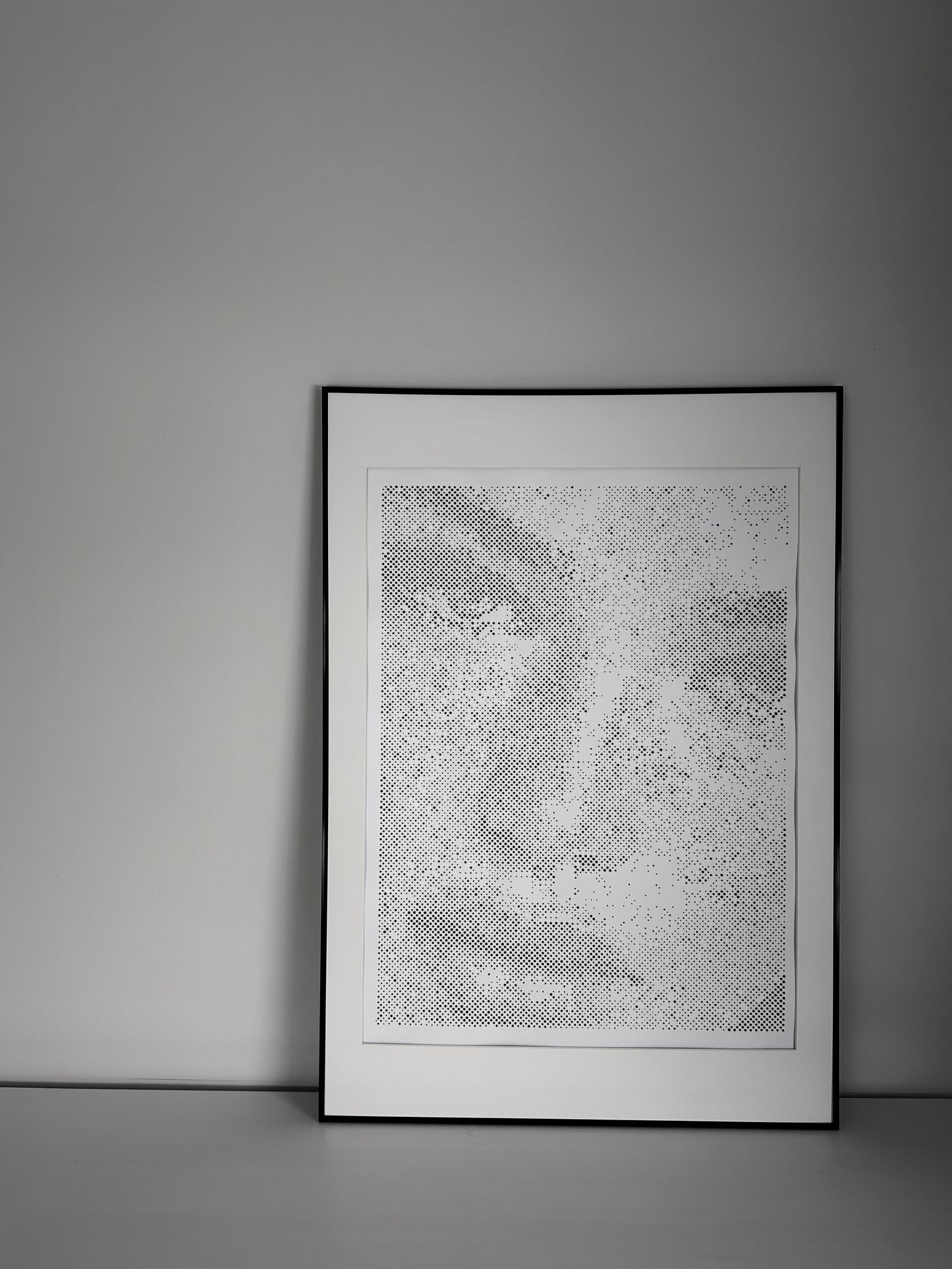 Original dot portrait artwork on wall – KARU Studio