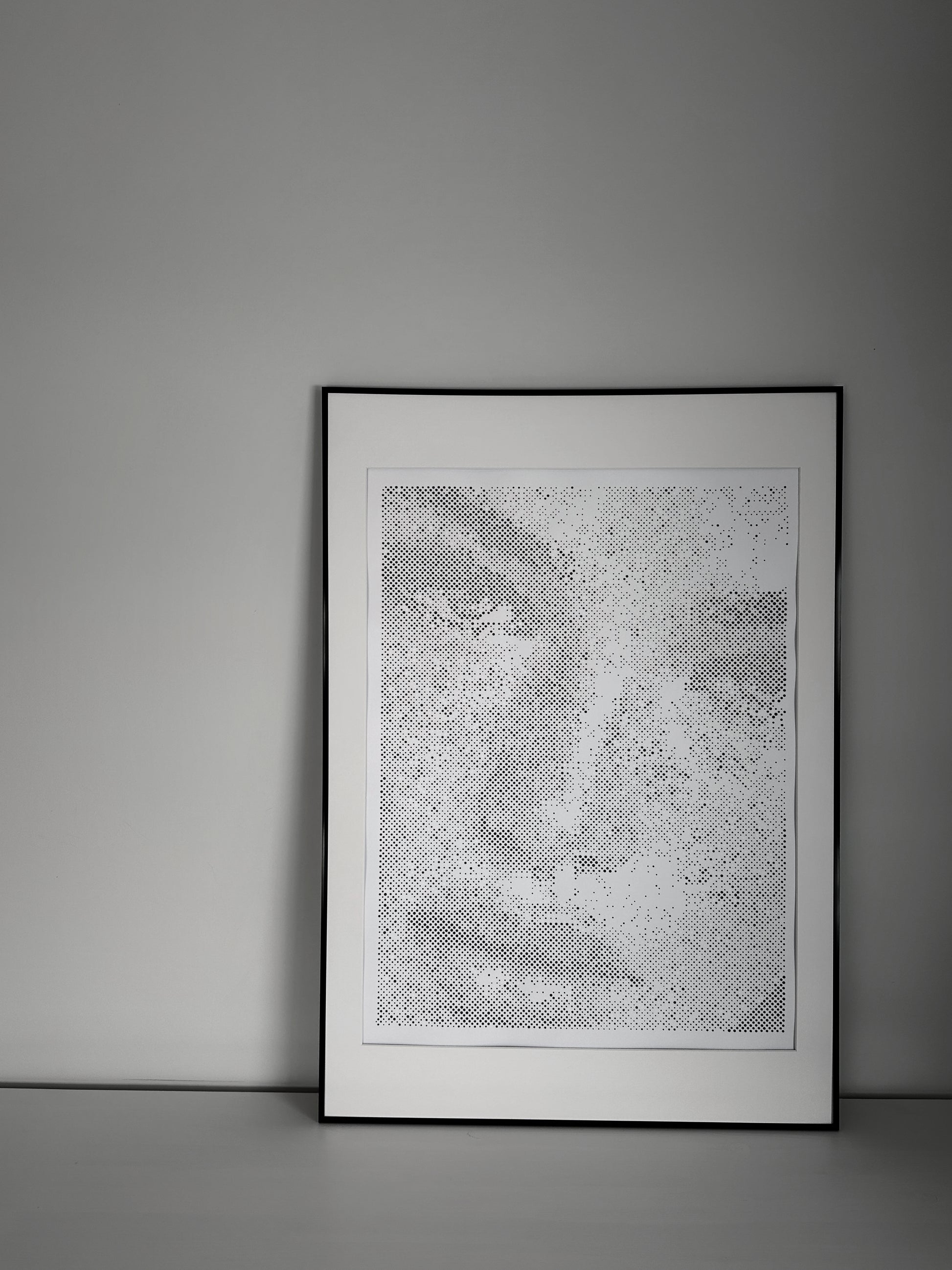 Original dot portrait artwork on wall – KARU Studio