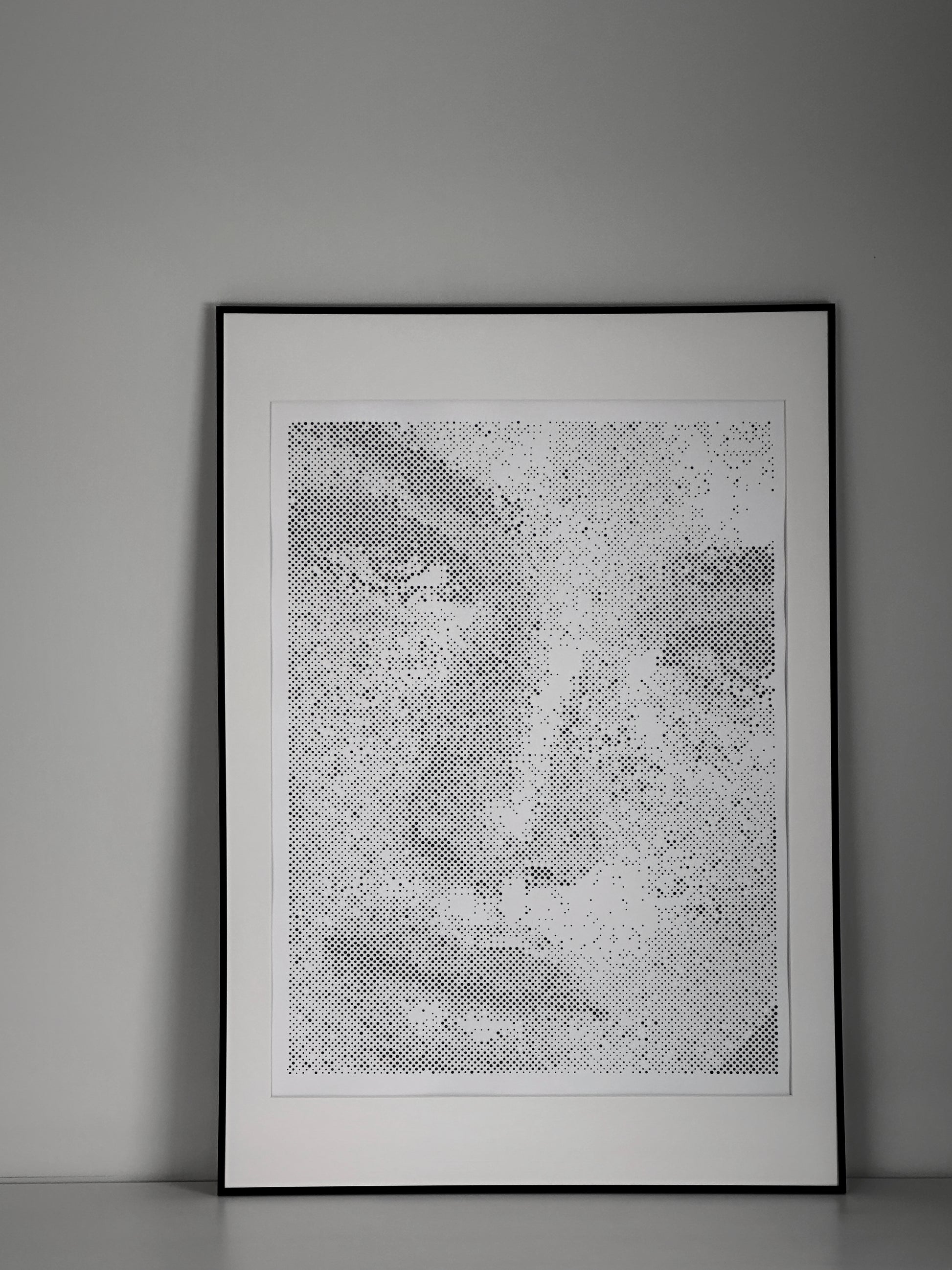 Original dot portrait artwork on wall – KARU Studio