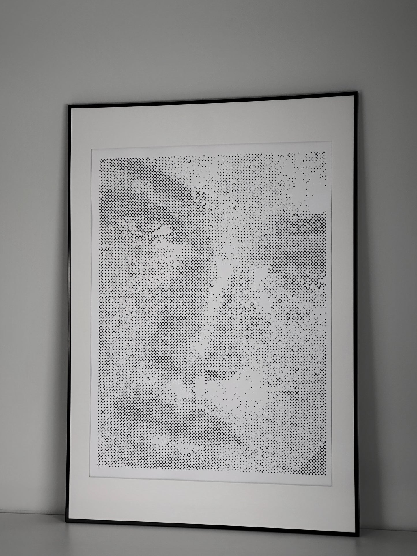 Original dot portrait artwork on wall – KARU Studio