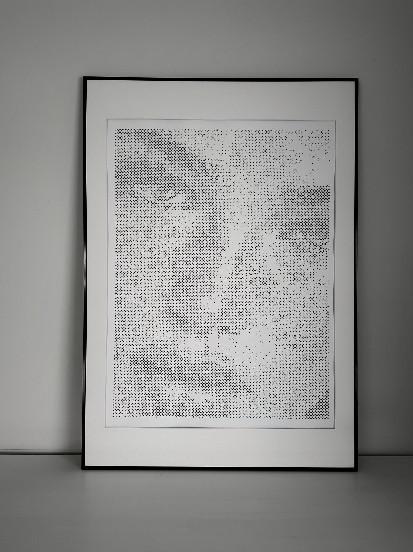 Original dot portrait artwork on wall – KARU Studio