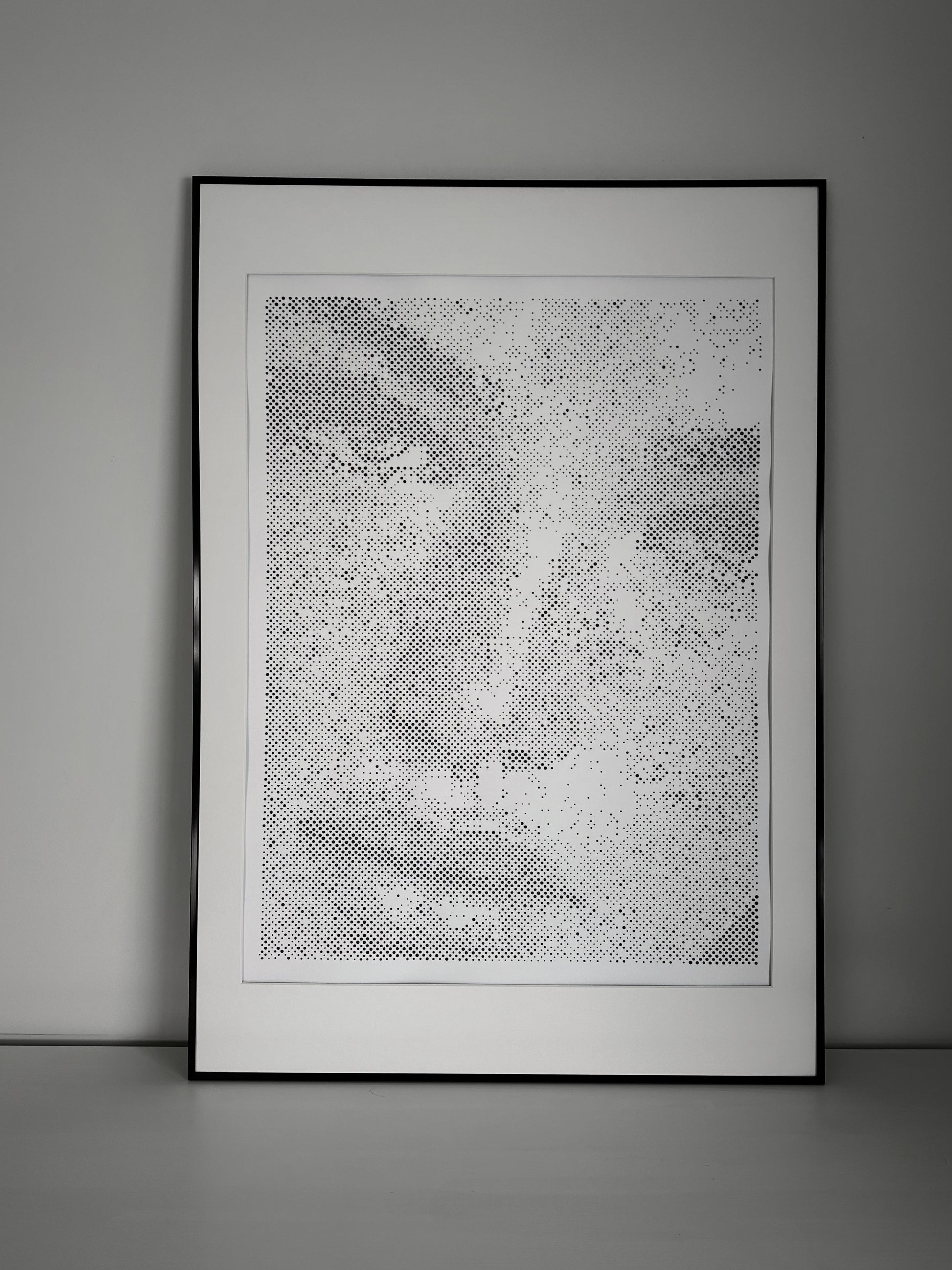 Original dot portrait artwork on wall – KARU Studio