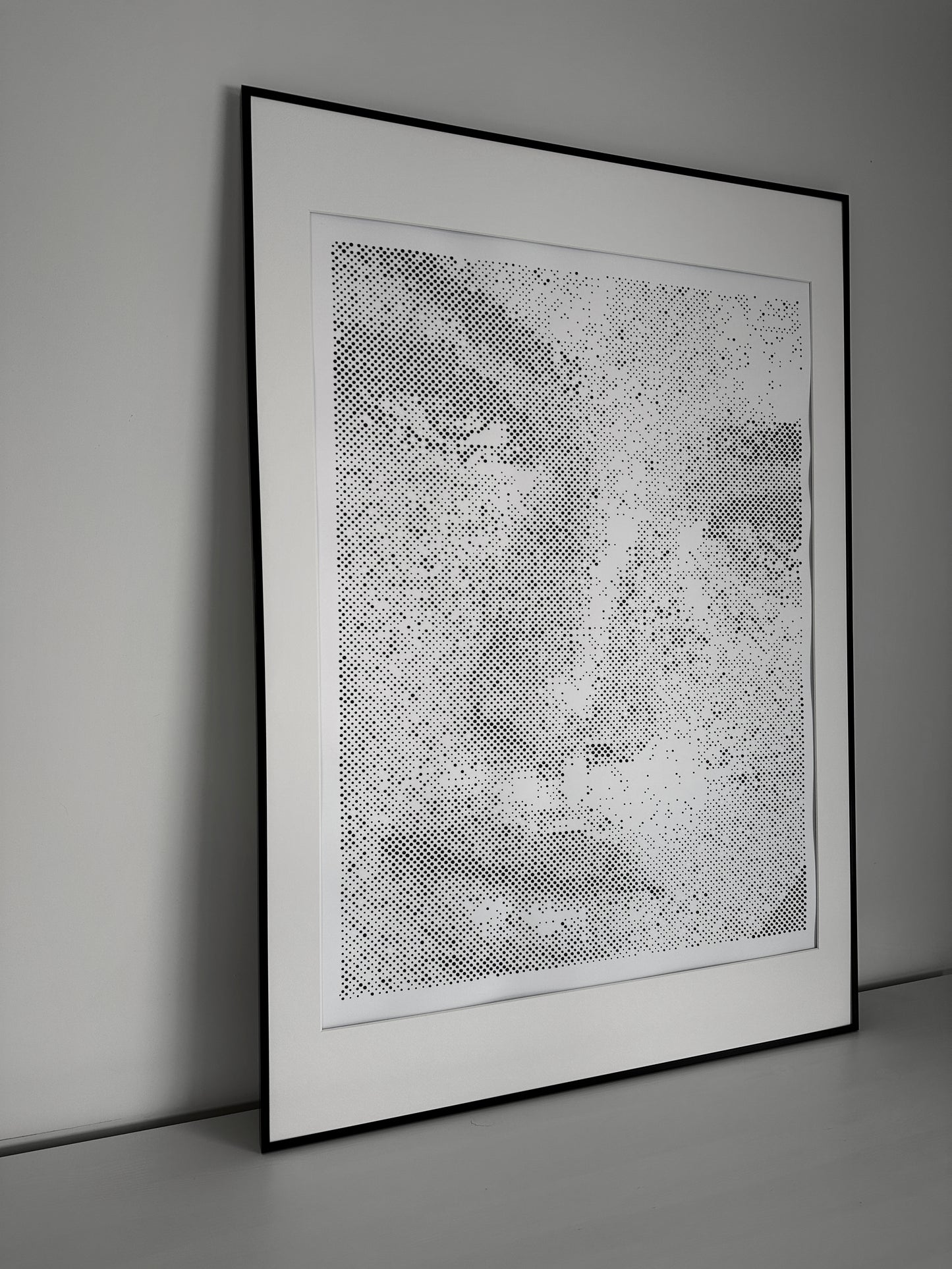 Original dot portrait artwork on wall – KARU Studio