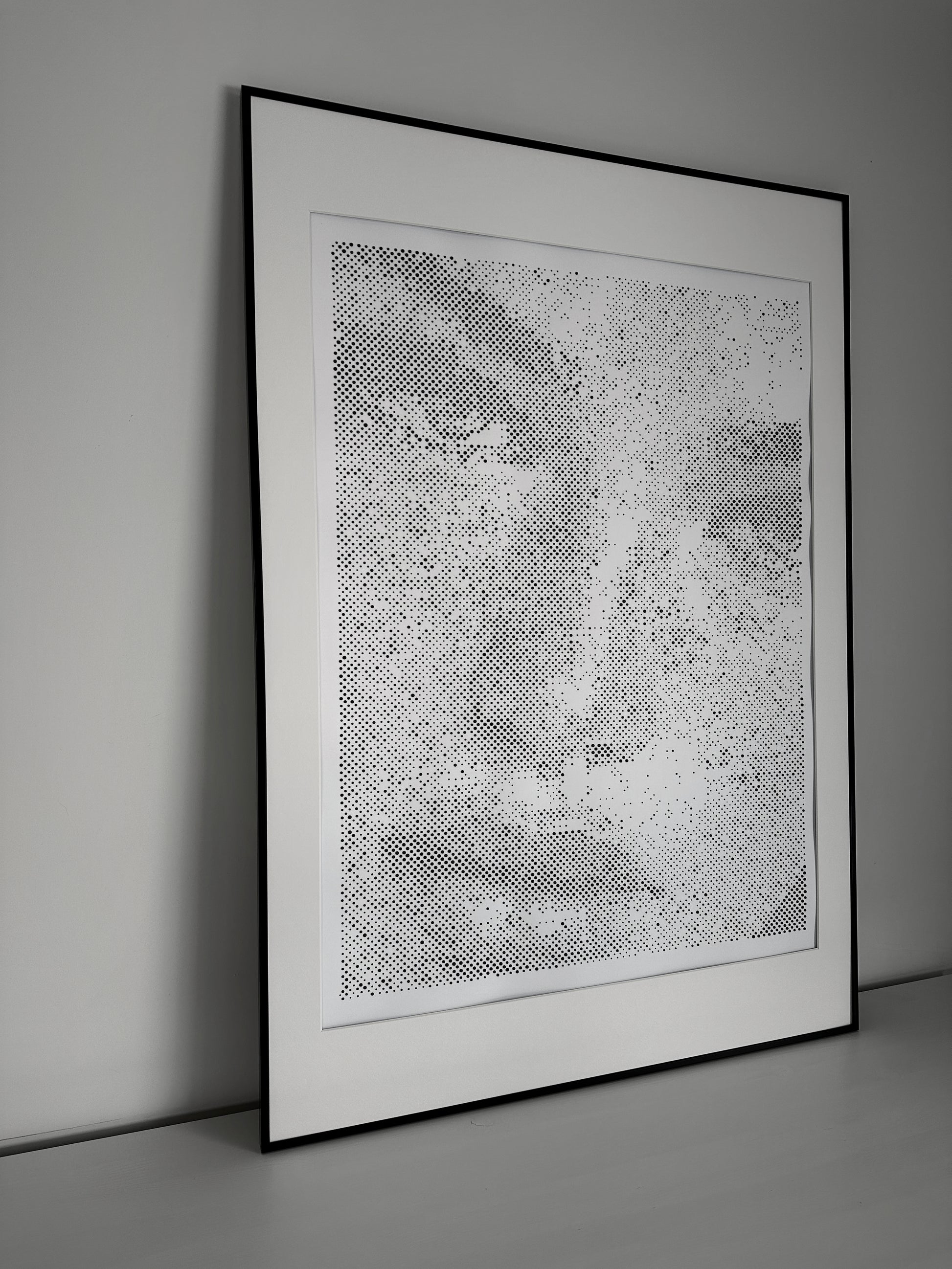 Original dot portrait artwork on wall – KARU Studio